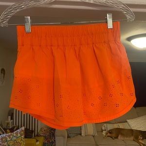 Lululemon final lap skort. Orange size 4